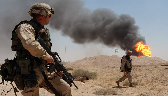 The US Invasion of Iraq: Marxist and Defensive Realist Perspectives