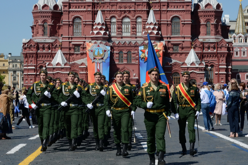 russian soldier war hero with a flag against the