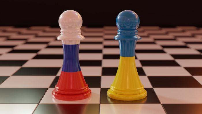 Russia vs Ukraine, crisis. War threat, conflict, Soldier on battlefield. National flag on chess piece on chessboard background. 3d render