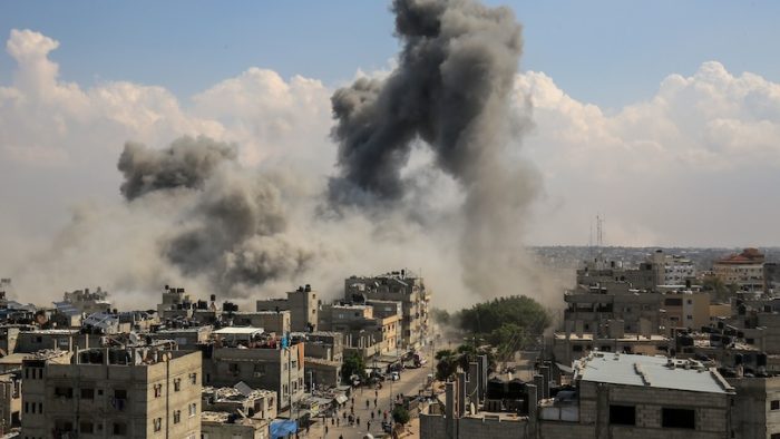 Smoke rises after Israeli air strikes of the city of Rafah in the southern Gaza Strip, October 10, 2023.