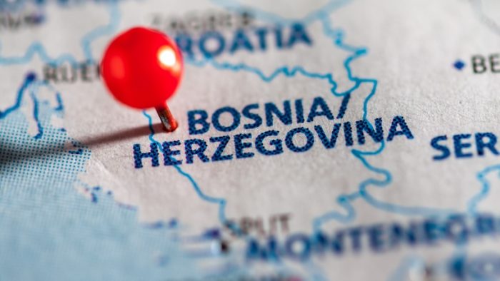 Bosnia Herzegovina pinned on a map of Europe.