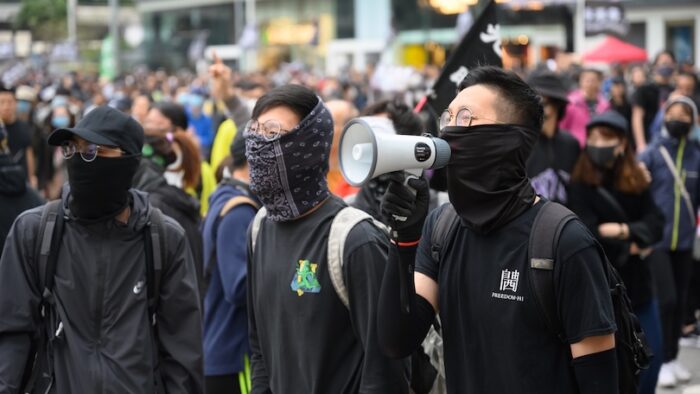 Hong Kong - Jan 1, 2020: A million attend demo, demand for universal suffrage, 2020 direct democratic elections for Legislative Council without functional constituency.