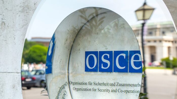 VIENNA, AUSTRIA - MAY 26: Signboard of the  OSCE(Organization for Security and Co-operation in Europe) on the building of Hofburg palace - Congress Centre in Vienna, Austria, on May 26, 2019.