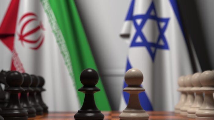 Flags behind pawns on the chessboard. Political rivalry related 3D