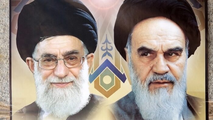 Iranian propaganda with the Ayatollah Khamenei and Ayatollah Khomeini at the Hazireh Mosque, Yazd, Iran.