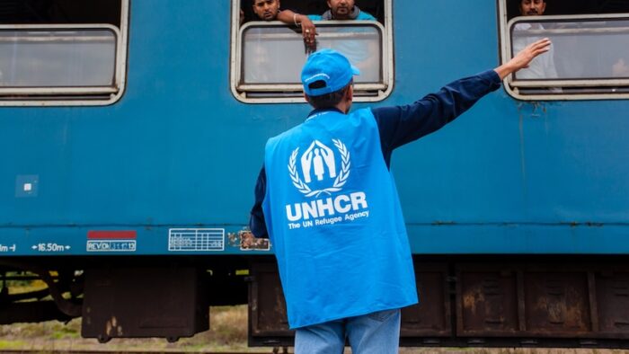 GYEKENYES- OCTOBER 6 : War refugees at the Gyekenyes Zakany Railway Station on 6 October 2015 in Gyekenyes, Hungary. Refugees are arriving constantly to Hungary on the way to Germany.