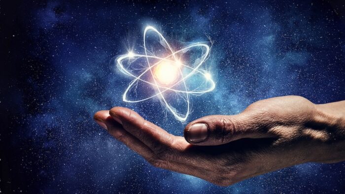 Human hand and atom molecule as science concept. 3d rendering